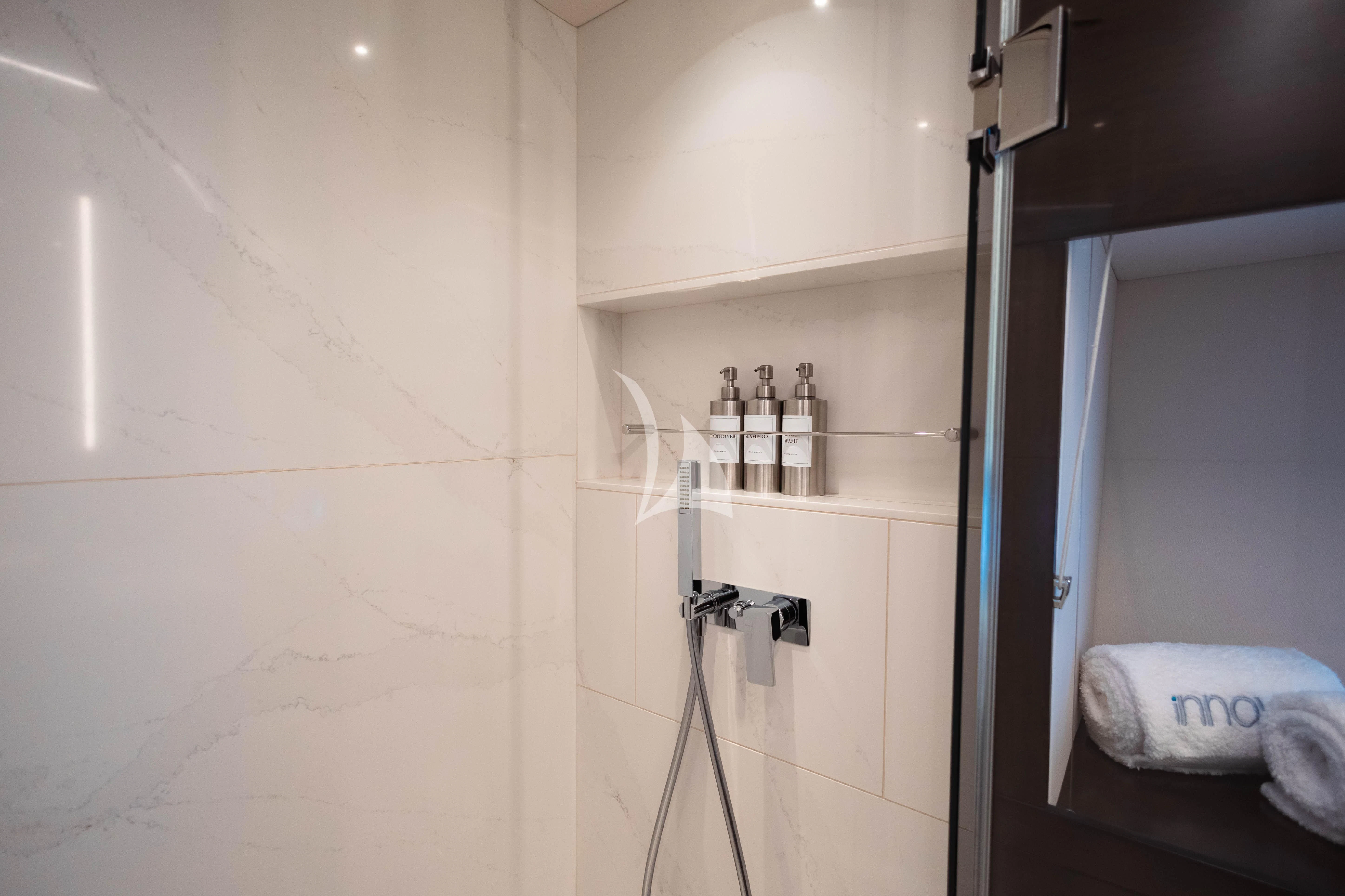 a bathroom with a sink and a mirror aboard MOONLIGHT Yacht for Sale