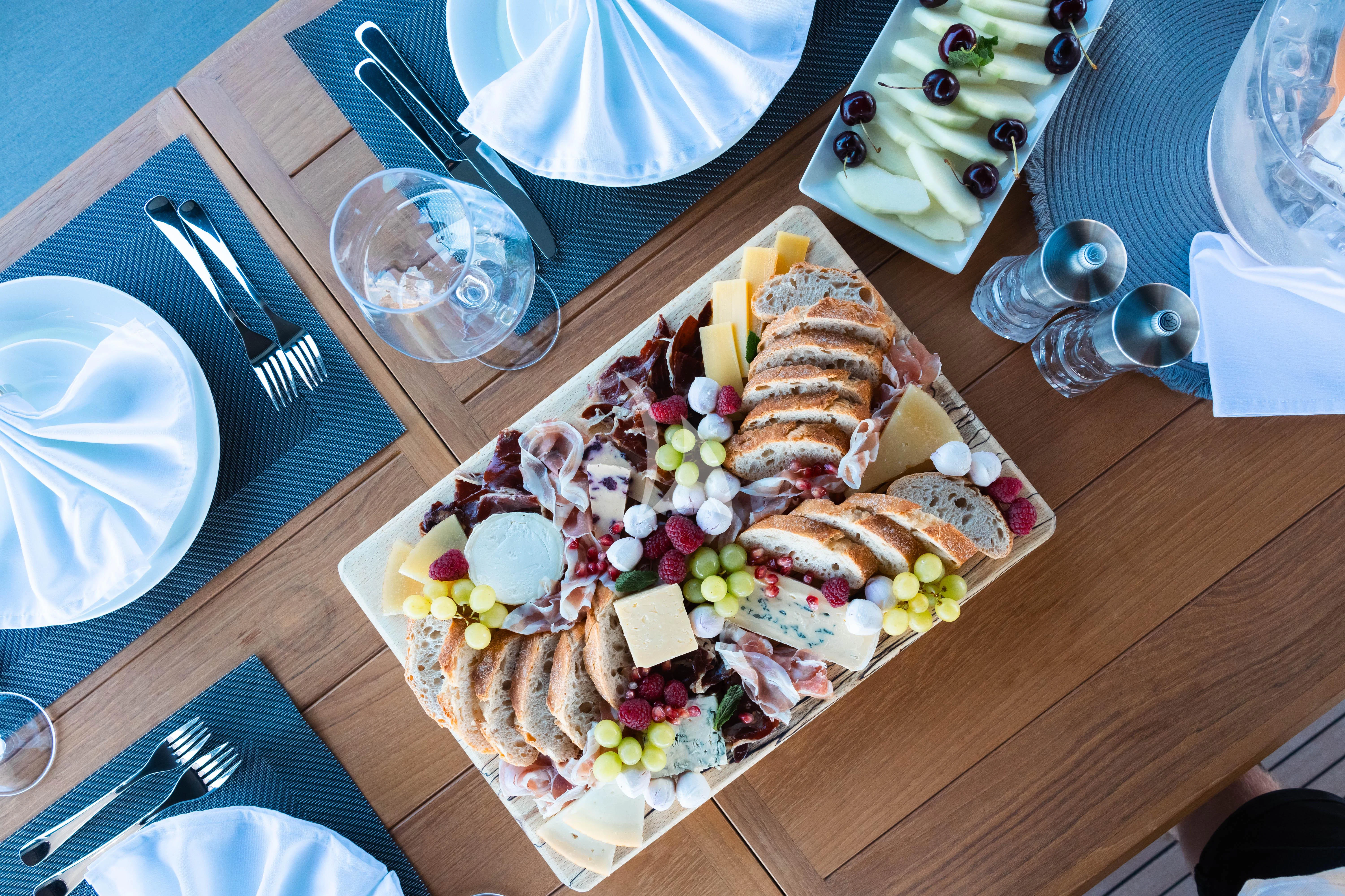 a plate of food on a table aboard MOONLIGHT Yacht for Sale