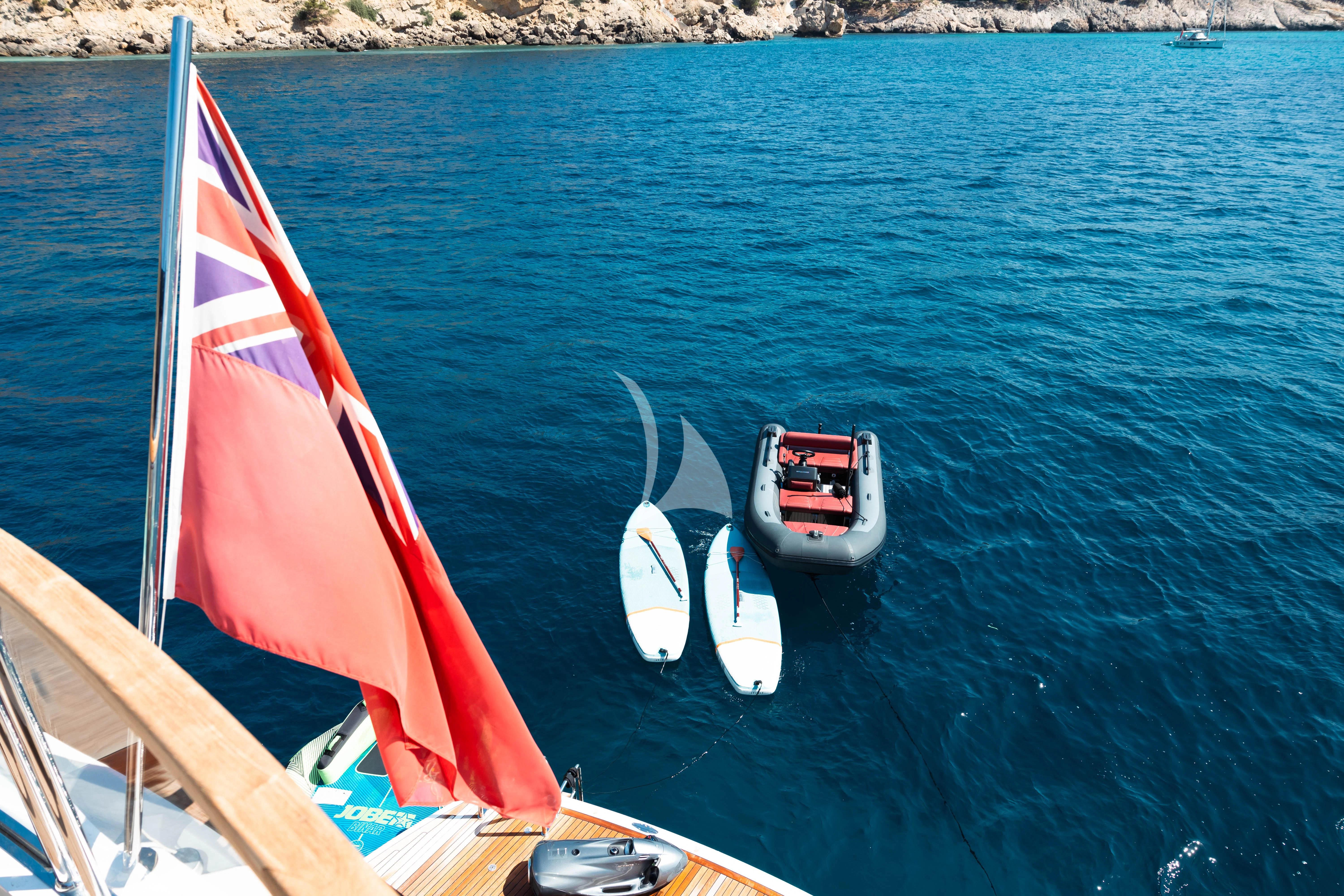 a boat with a sail on the water aboard MOONLIGHT Yacht for Sale