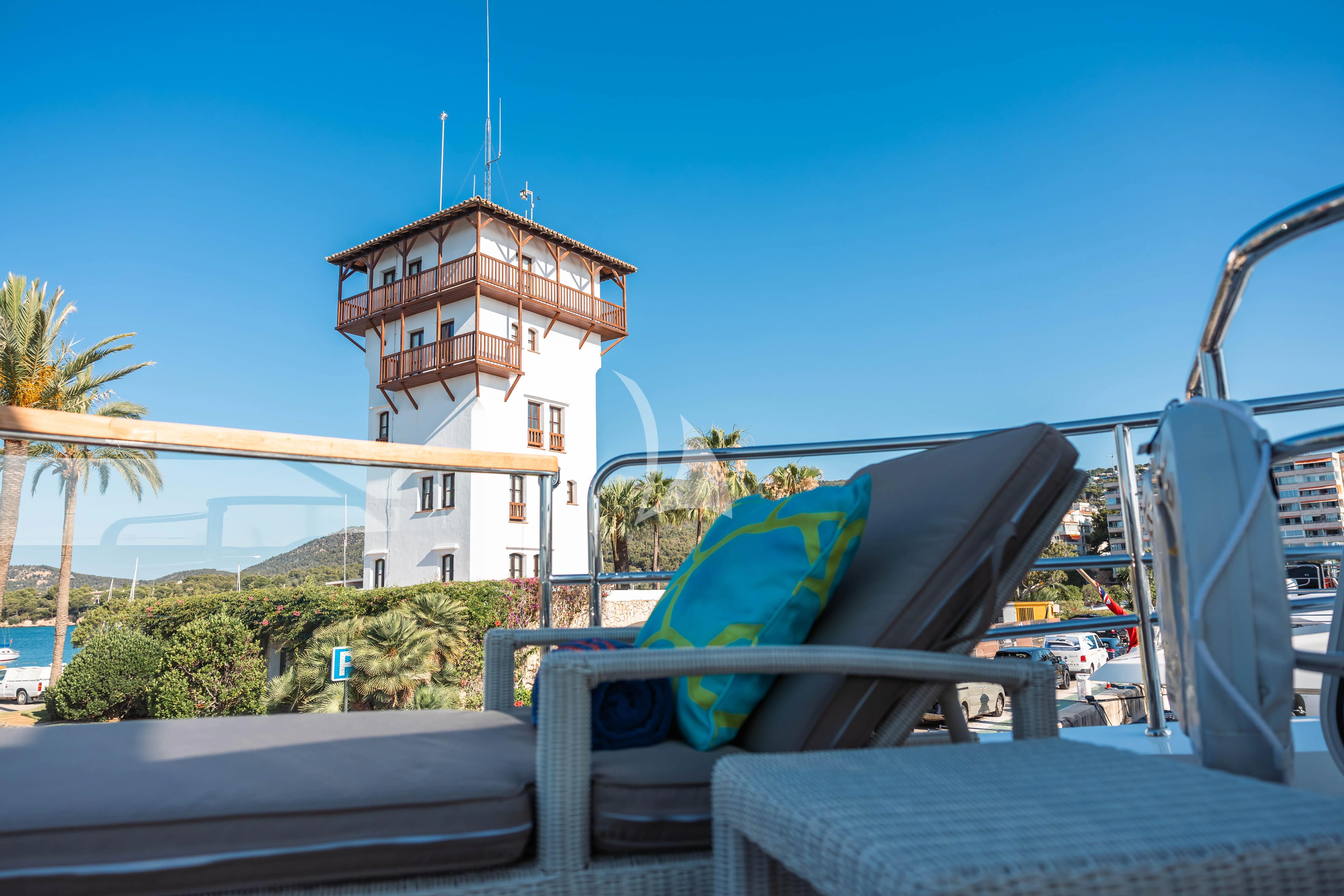 a chair on a balcony aboard MOONLIGHT Yacht for Sale