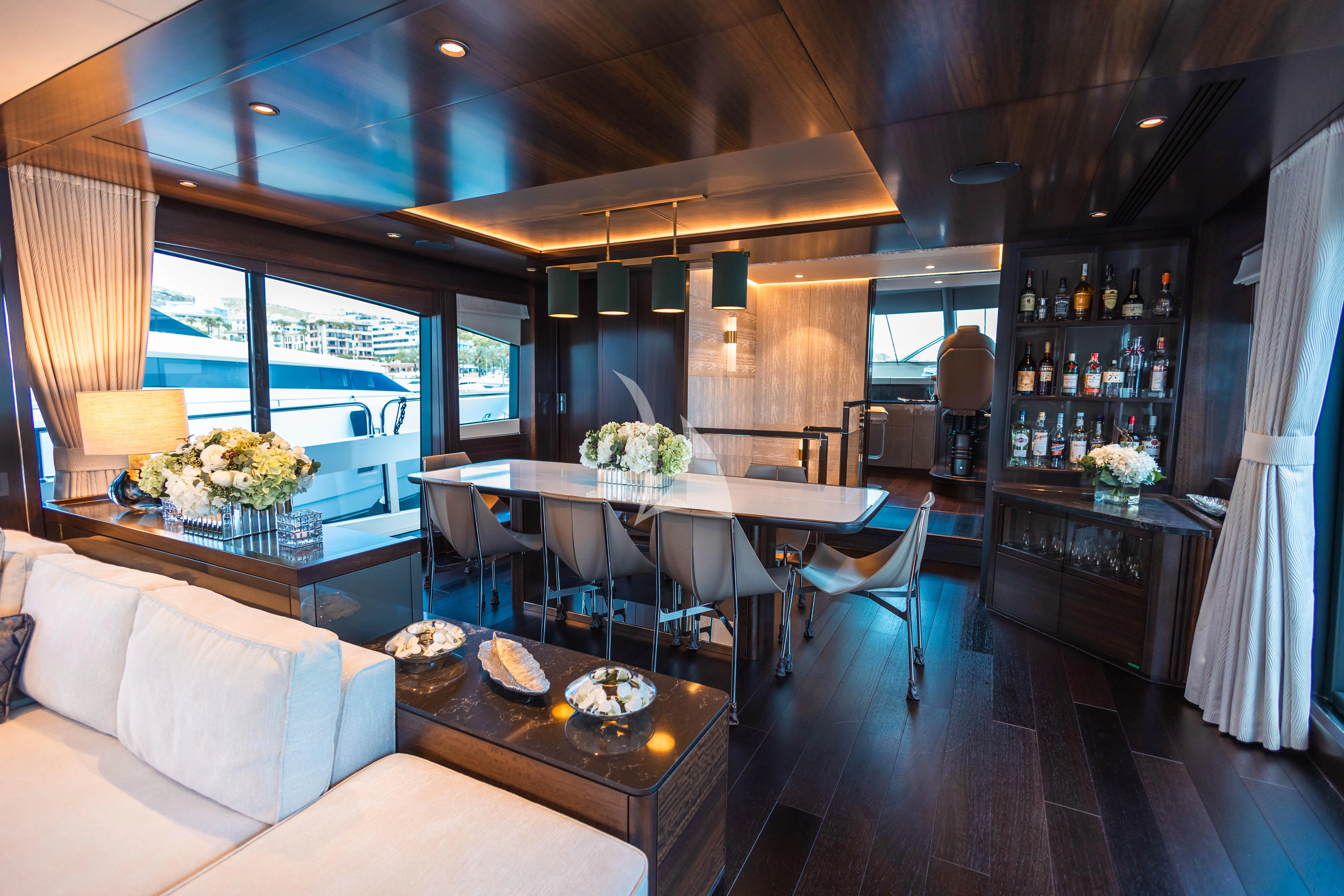 a kitchen and dining area aboard MOONLIGHT Yacht for Sale
