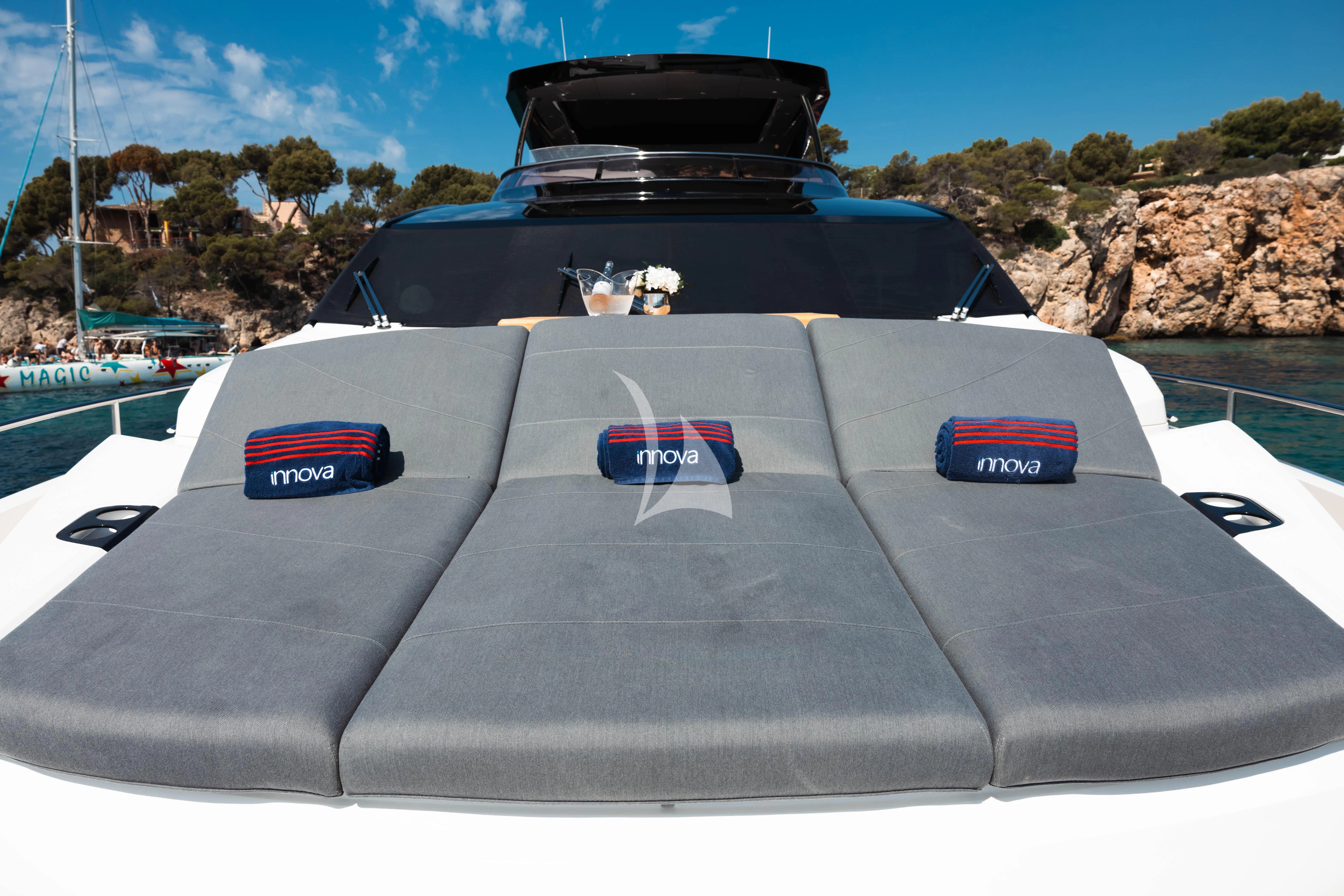 the back of a black sports car on a race track aboard MOONLIGHT Yacht for Sale