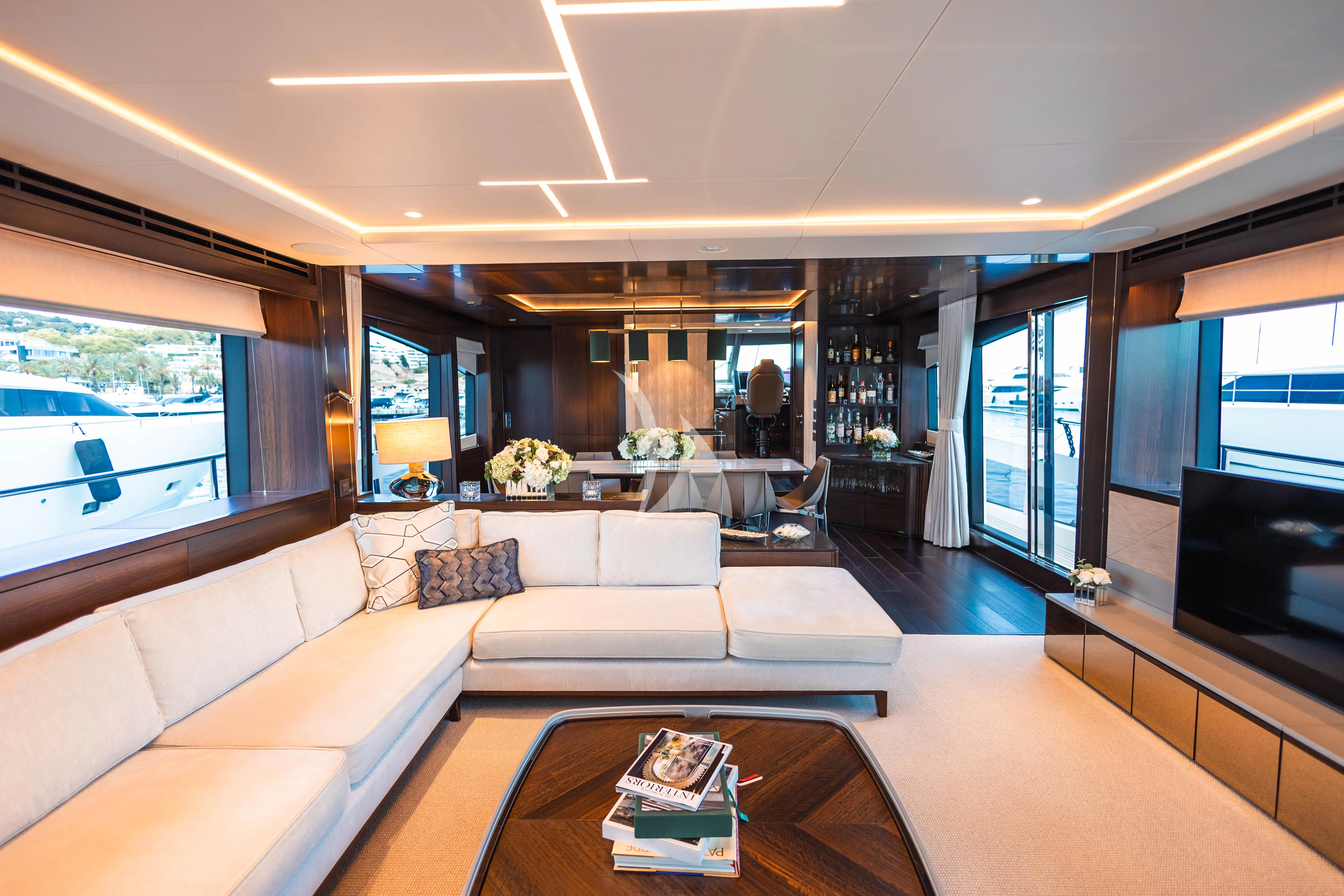 a living room with a large window aboard MOONLIGHT Yacht for Sale