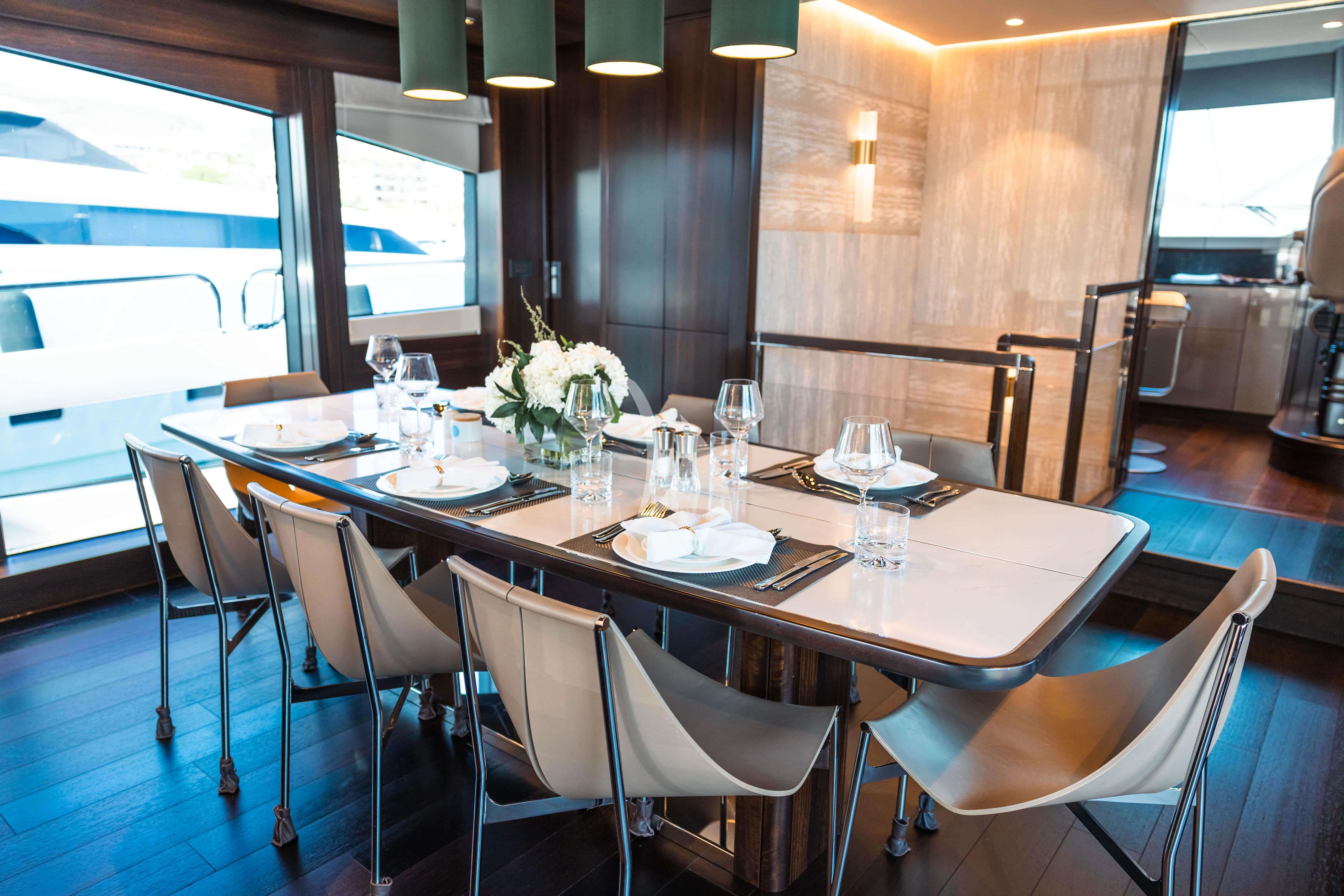 a table set for a dinner aboard MOONLIGHT Yacht for Sale