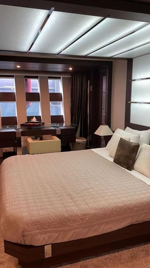 a hotel room with a bed aboard DUKE Yacht for Sale
