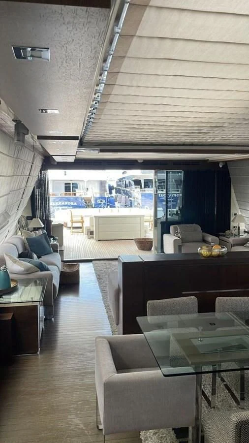 a room with a view of a city and a large window aboard DUKE Yacht for Sale