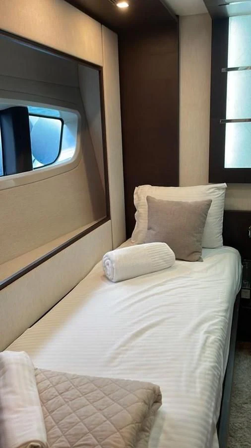 a bed with pillows aboard DUKE Yacht for Sale