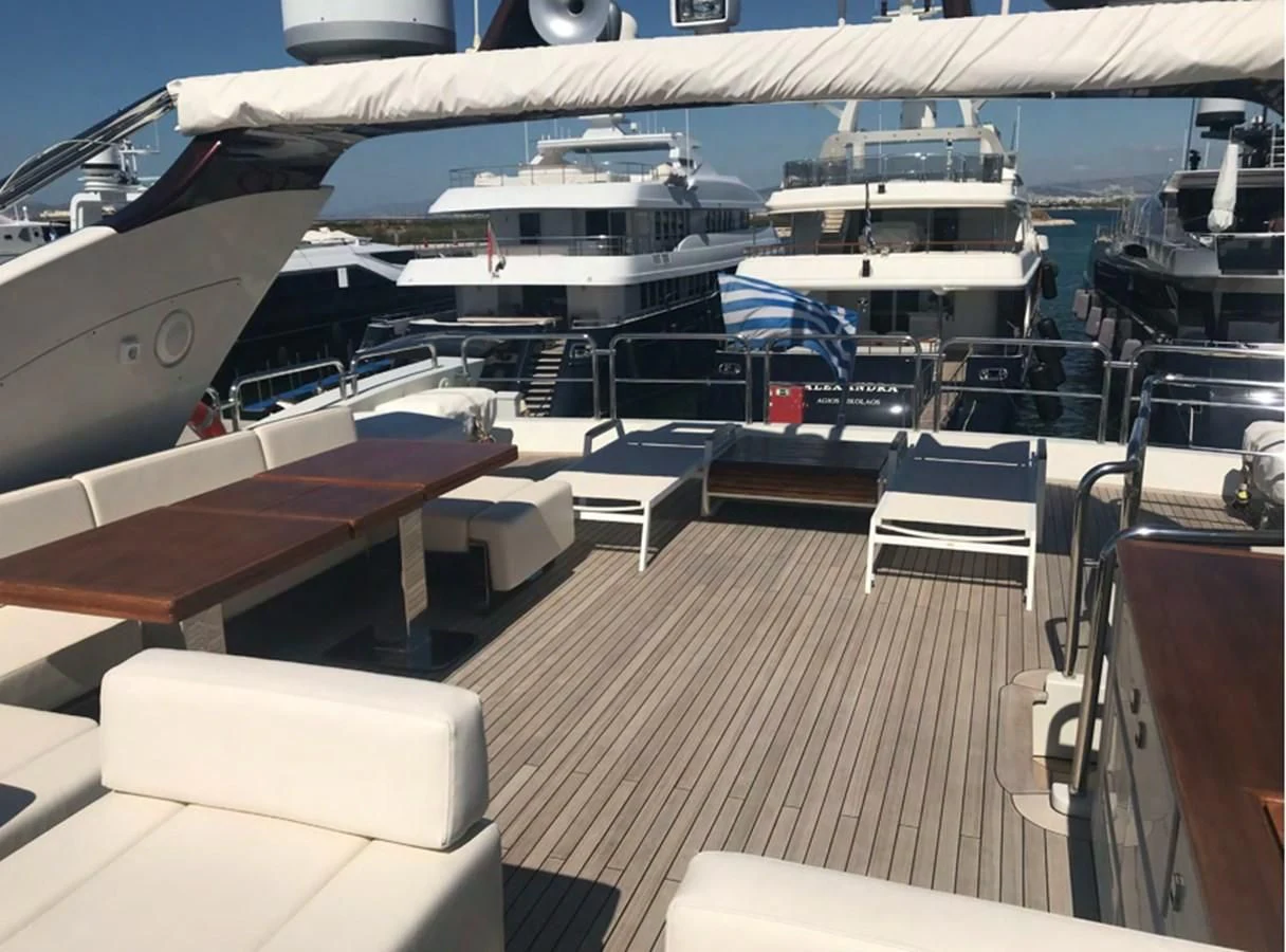 a boat with many seats aboard DUKE Yacht for Sale
