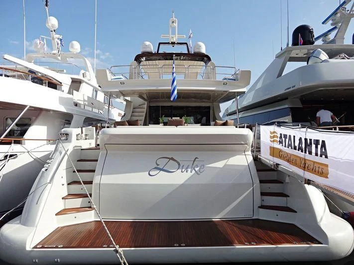 a large ship with a large ship in the background aboard DUKE Yacht for Sale