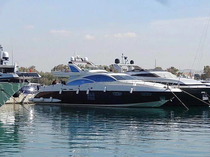 a boat docked at a pier aboard DUKE Yacht for Sale