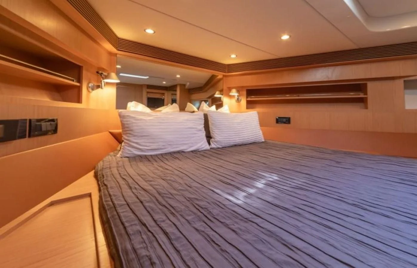 a large bed in a room aboard HEADQUARTERS Yacht for Sale