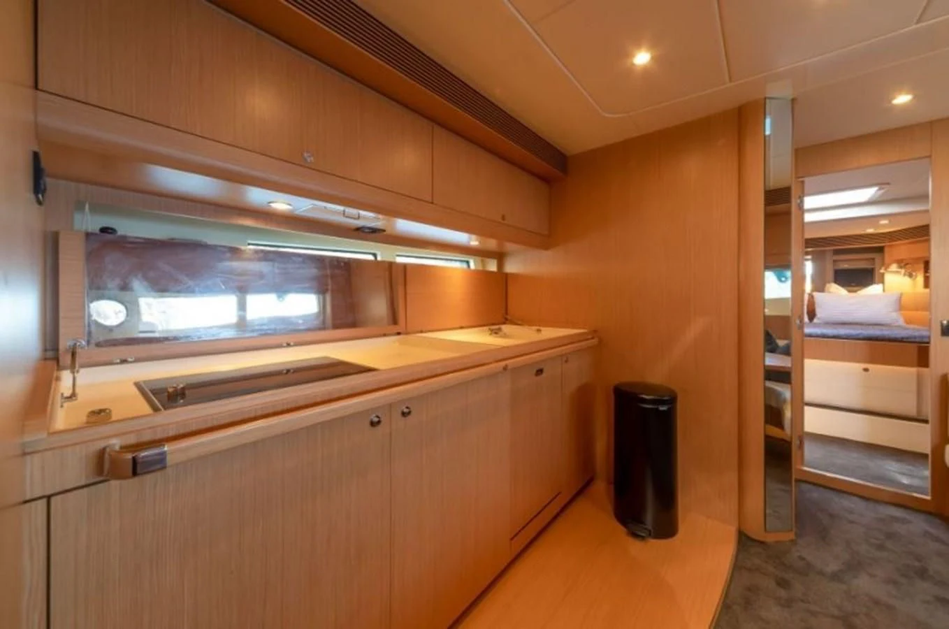 a kitchen with a large counter aboard HEADQUARTERS Yacht for Sale