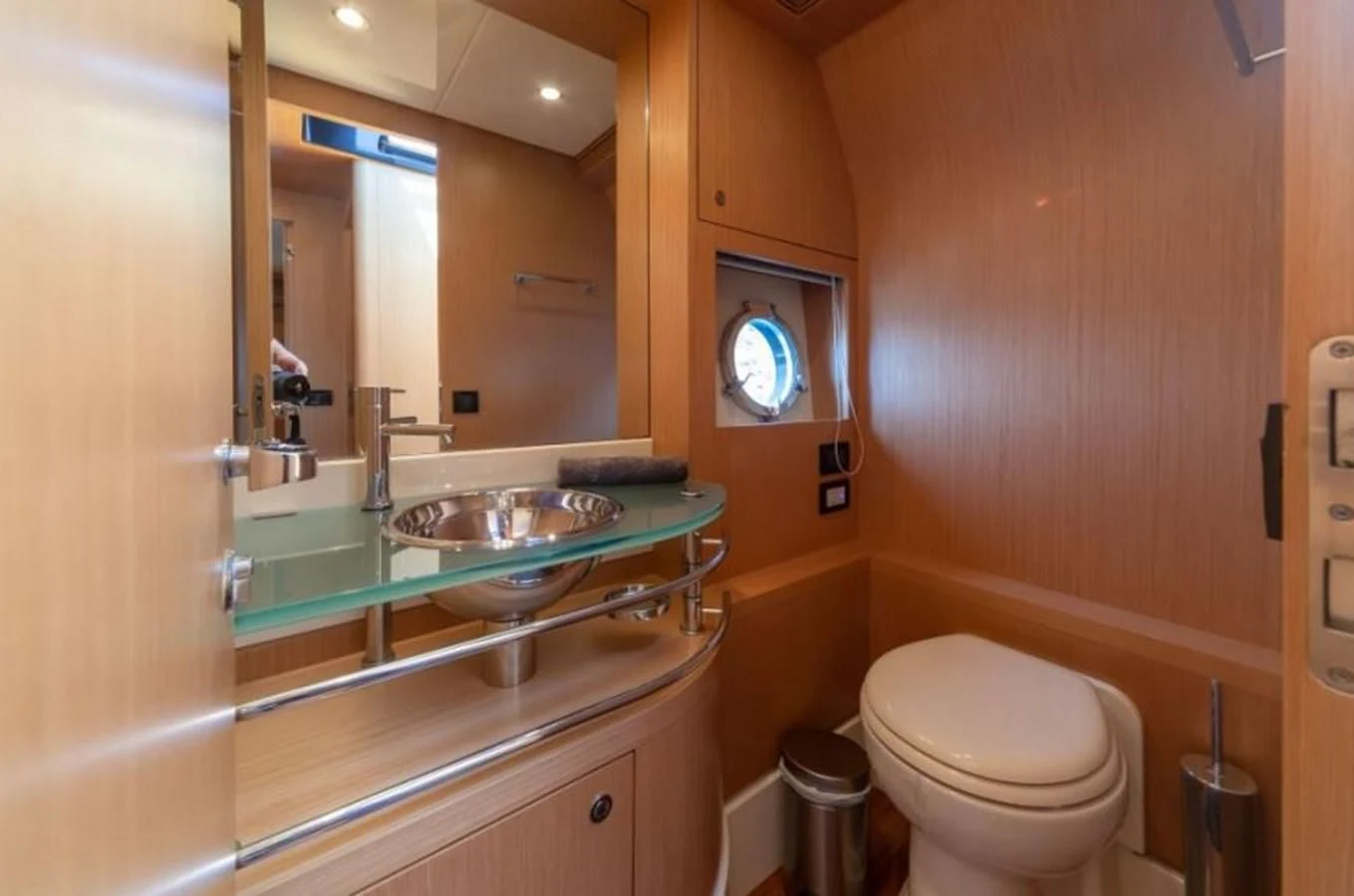 a bathroom with a sink and a toilet aboard HEADQUARTERS Yacht for Sale