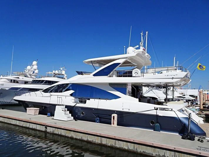 a large yacht docked aboard SKYE Yacht for Sale