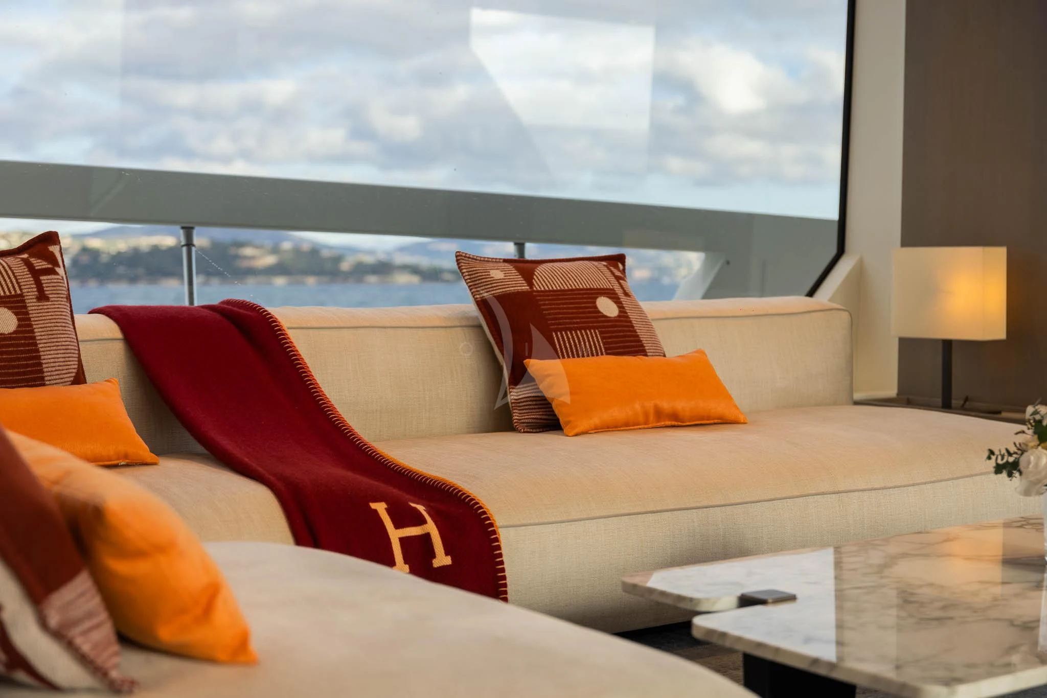 a couch with pillows aboard VINCI II Yacht for Sale
