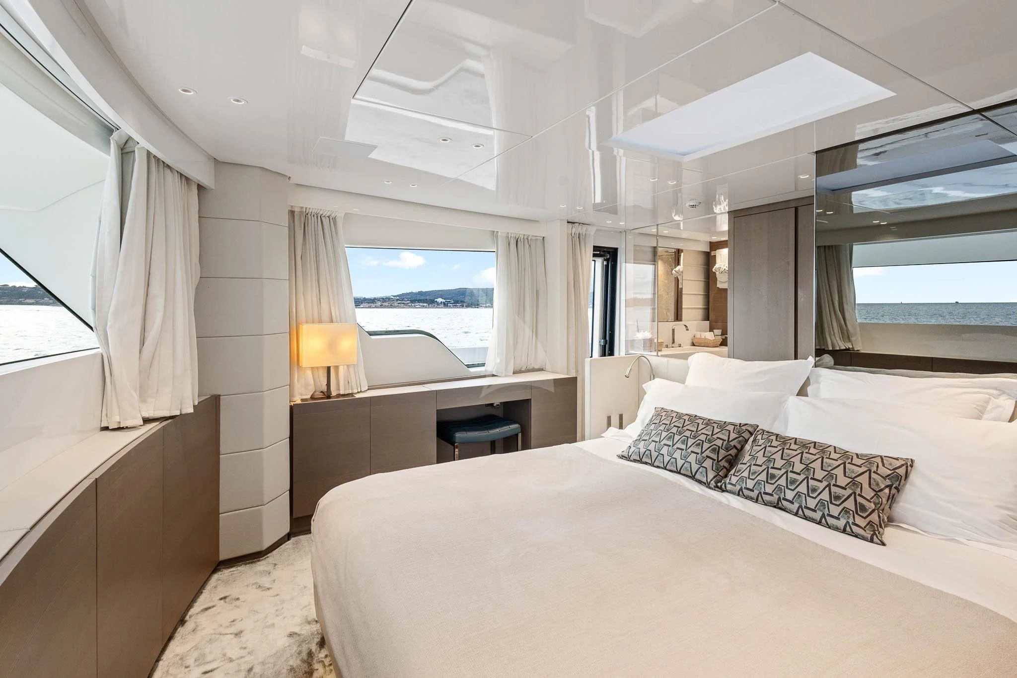 a bedroom with a large bed aboard VINCI II Yacht for Sale