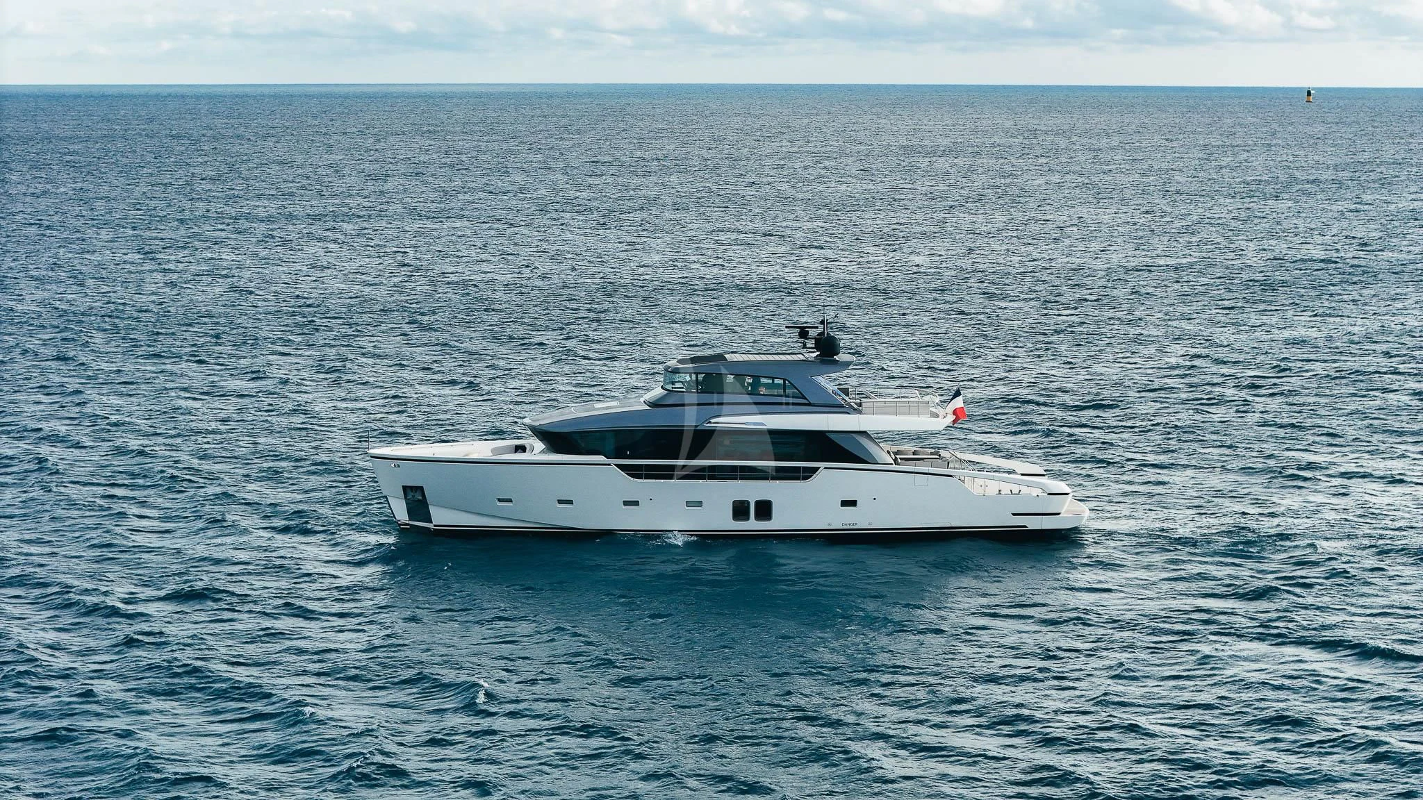 a white boat in the water aboard VINCI II Yacht for Sale