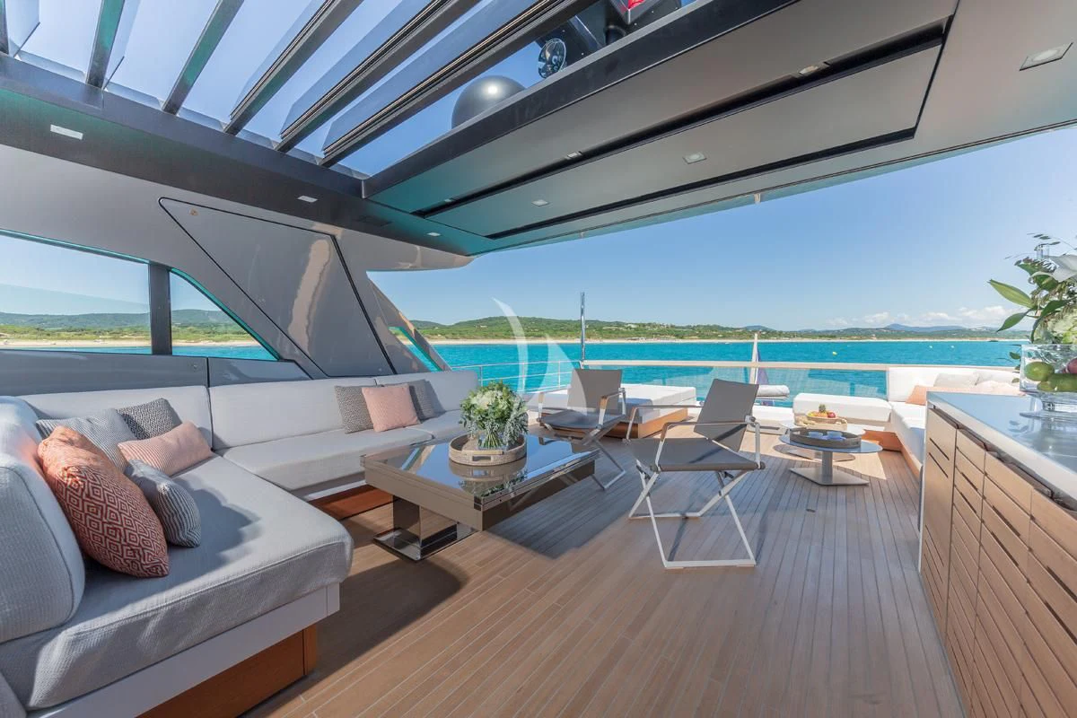 a room with a couch and a pool aboard VINCI II Yacht for Sale