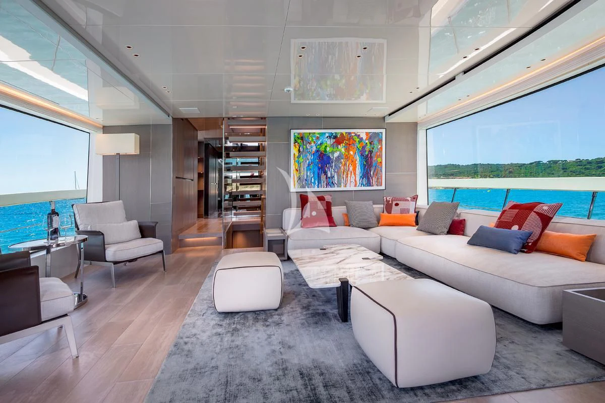 a living room with a large window aboard VINCI II Yacht for Sale