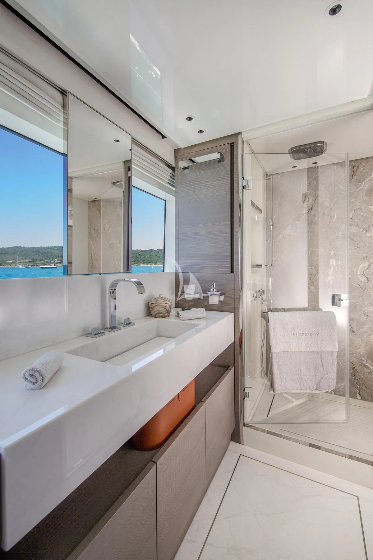a bathroom with a sink and a shower aboard VINCI II Yacht for Sale