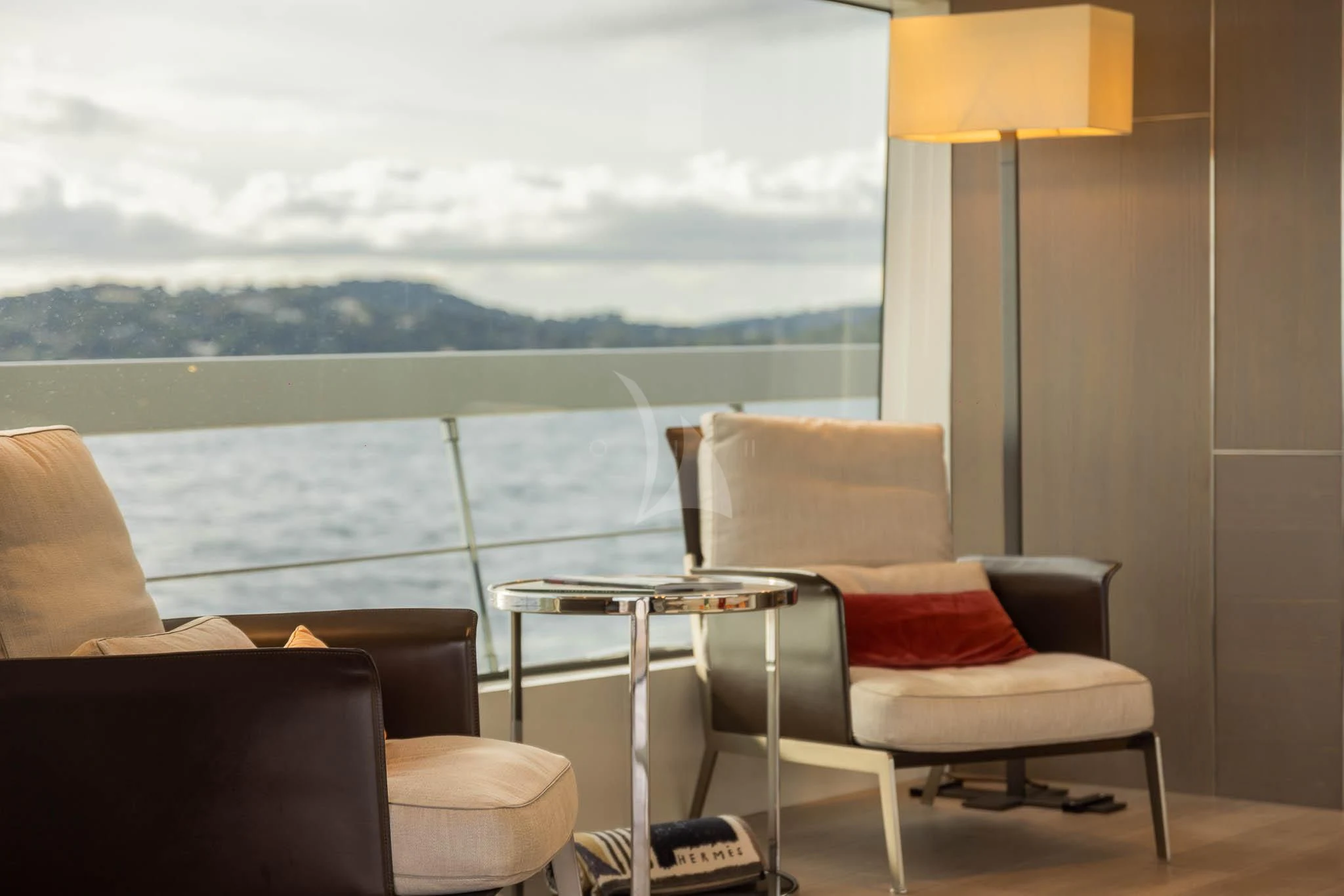 a room with a table and chairs aboard VINCI II Yacht for Sale