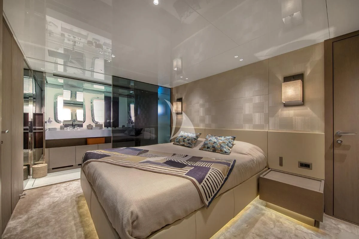 a bedroom with a bed aboard VINCI II Yacht for Sale