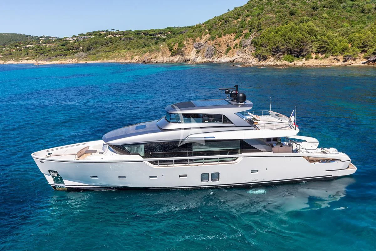 a white yacht in the water aboard VINCI II Yacht for Sale