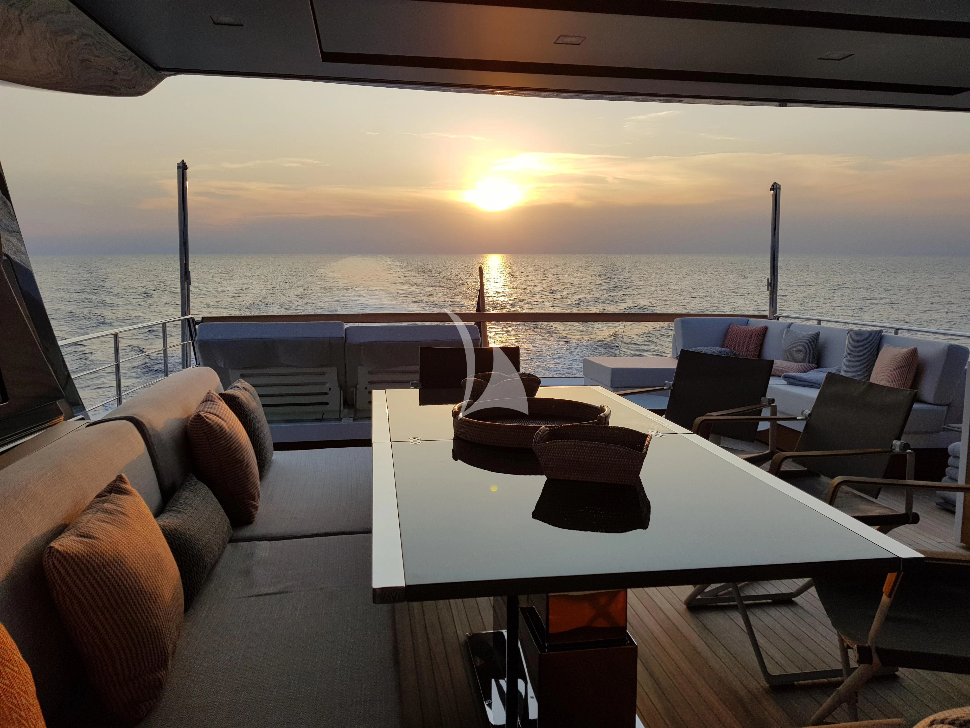 a table on a boat aboard VINCI II Yacht for Sale