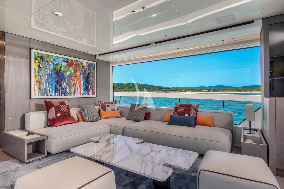a room with a large bed and a large window aboard VINCI II Yacht for Sale