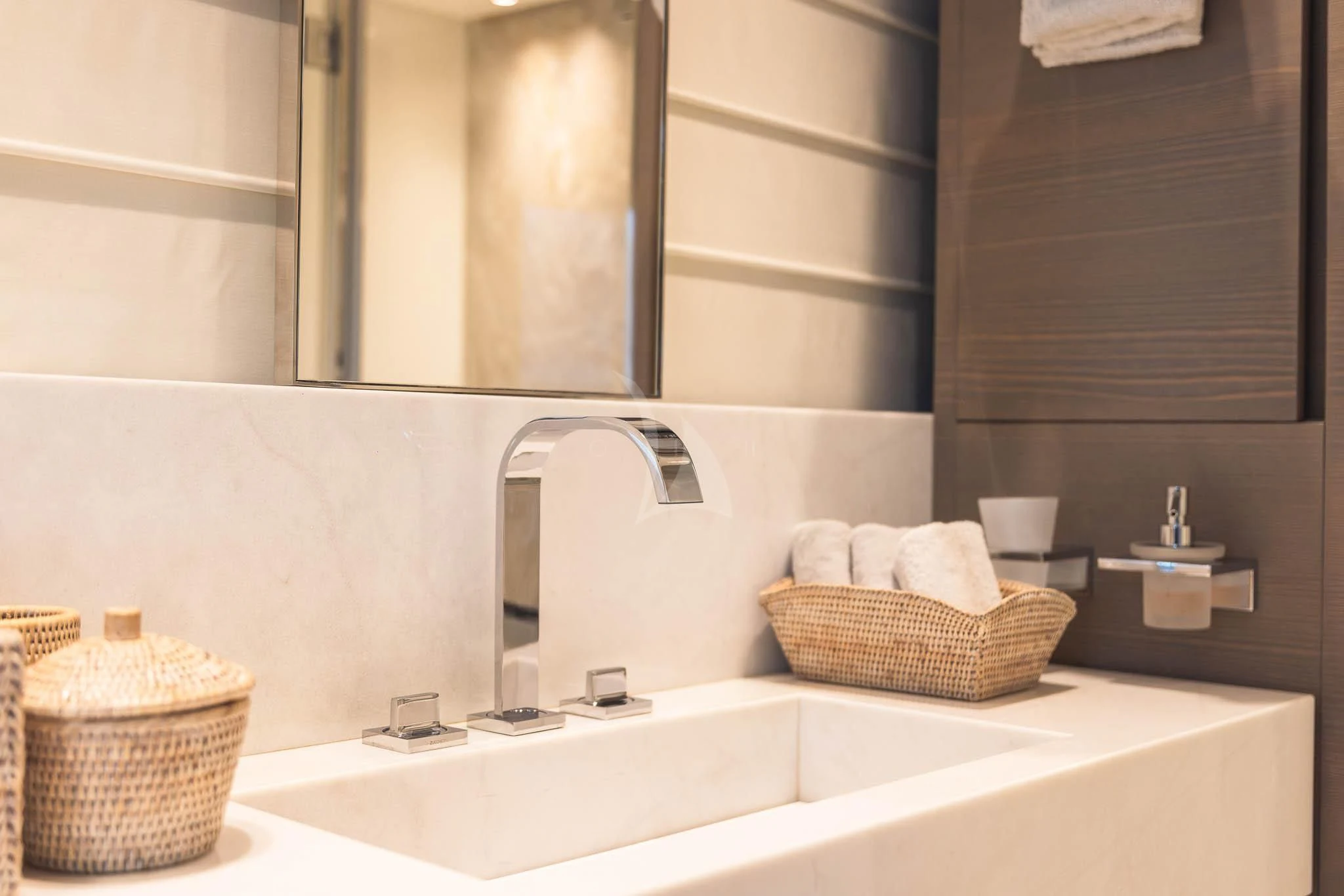 a bathroom with a large mirror aboard VINCI II Yacht for Sale