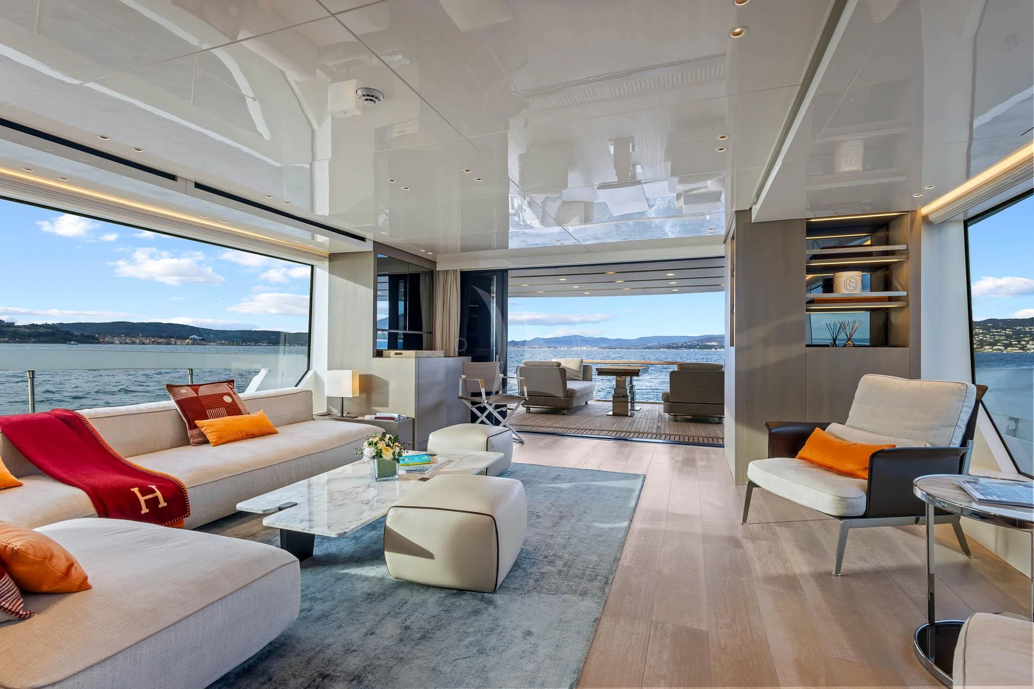 a living room with a large window aboard VINCI II Yacht for Sale