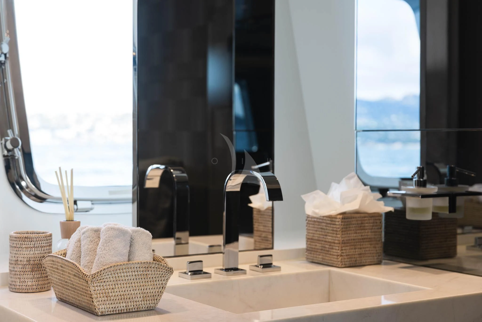 a bathroom with a large mirror aboard VINCI II Yacht for Sale