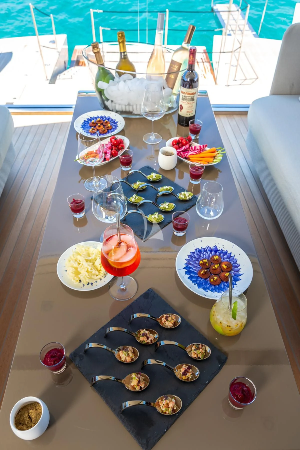 a table with food on it aboard VINCI II Yacht for Sale