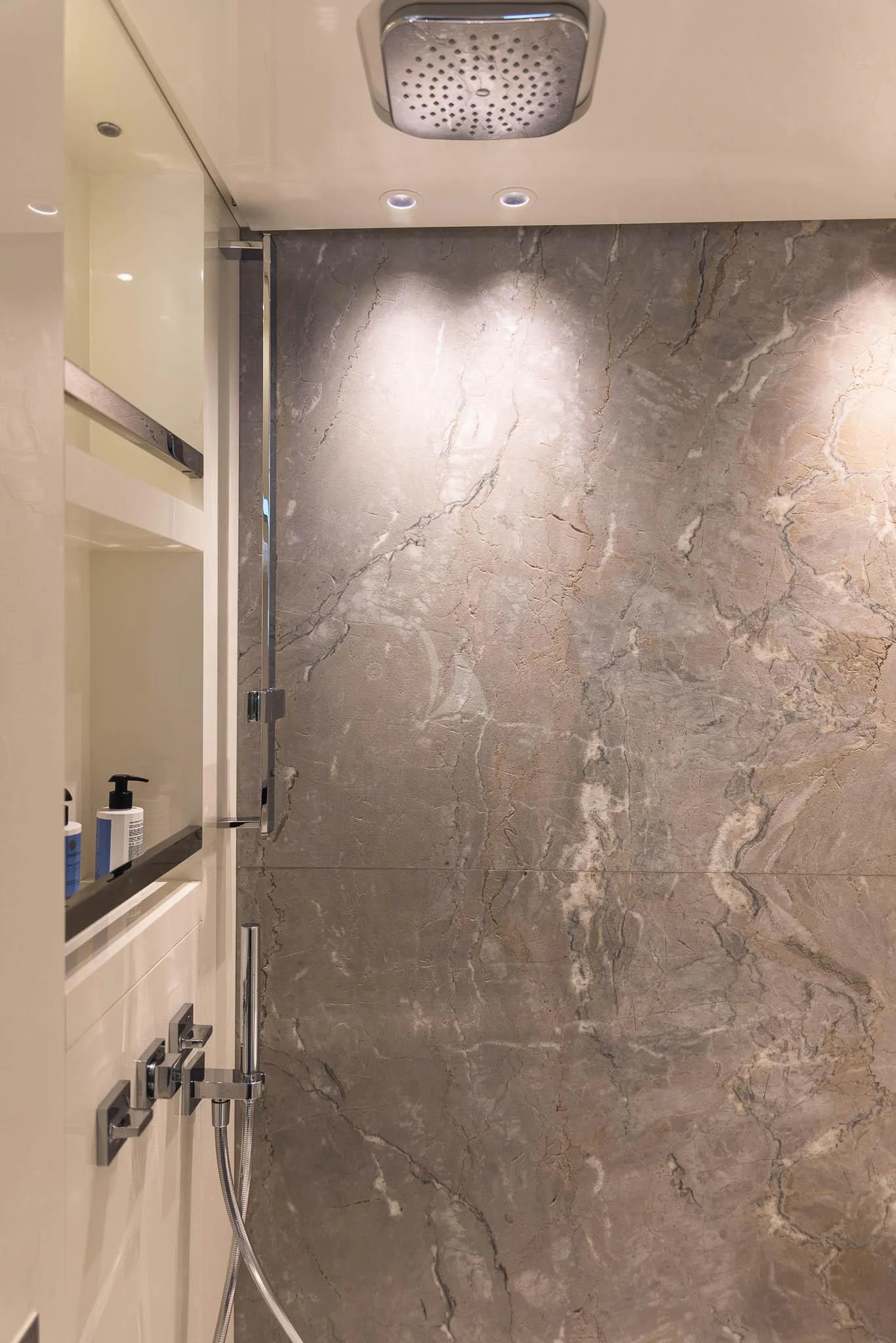 a bathroom with a marble floor aboard VINCI II Yacht for Sale