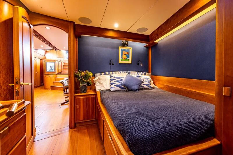 a bed in a room aboard BOLERO Yacht for Sale