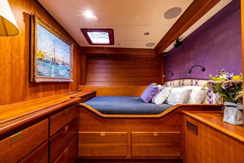a bed in a room aboard BOLERO Yacht for Sale