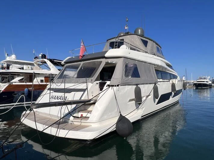 a white boat in the water aboard HANAVA Yacht for Sale