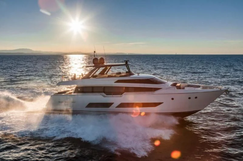 a white yacht on the water aboard HANAVA Yacht for Sale