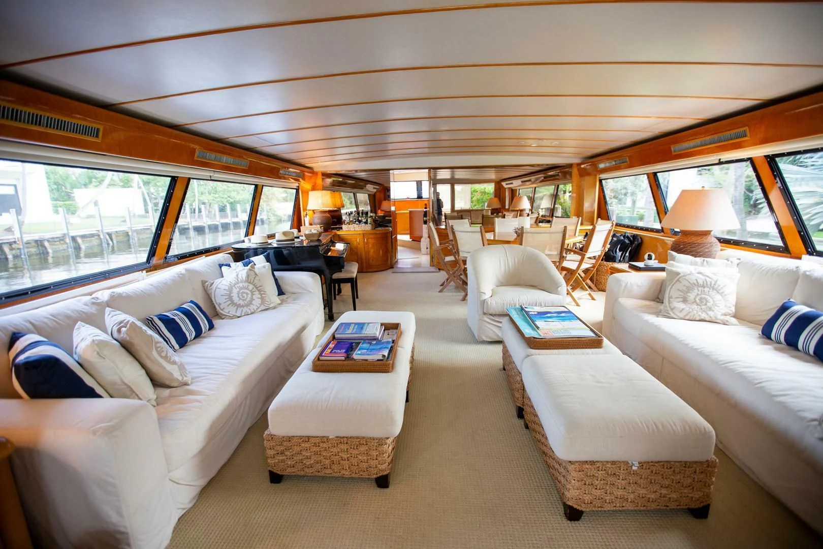 a living room with a large window aboard PAINKILLER Yacht for Sale