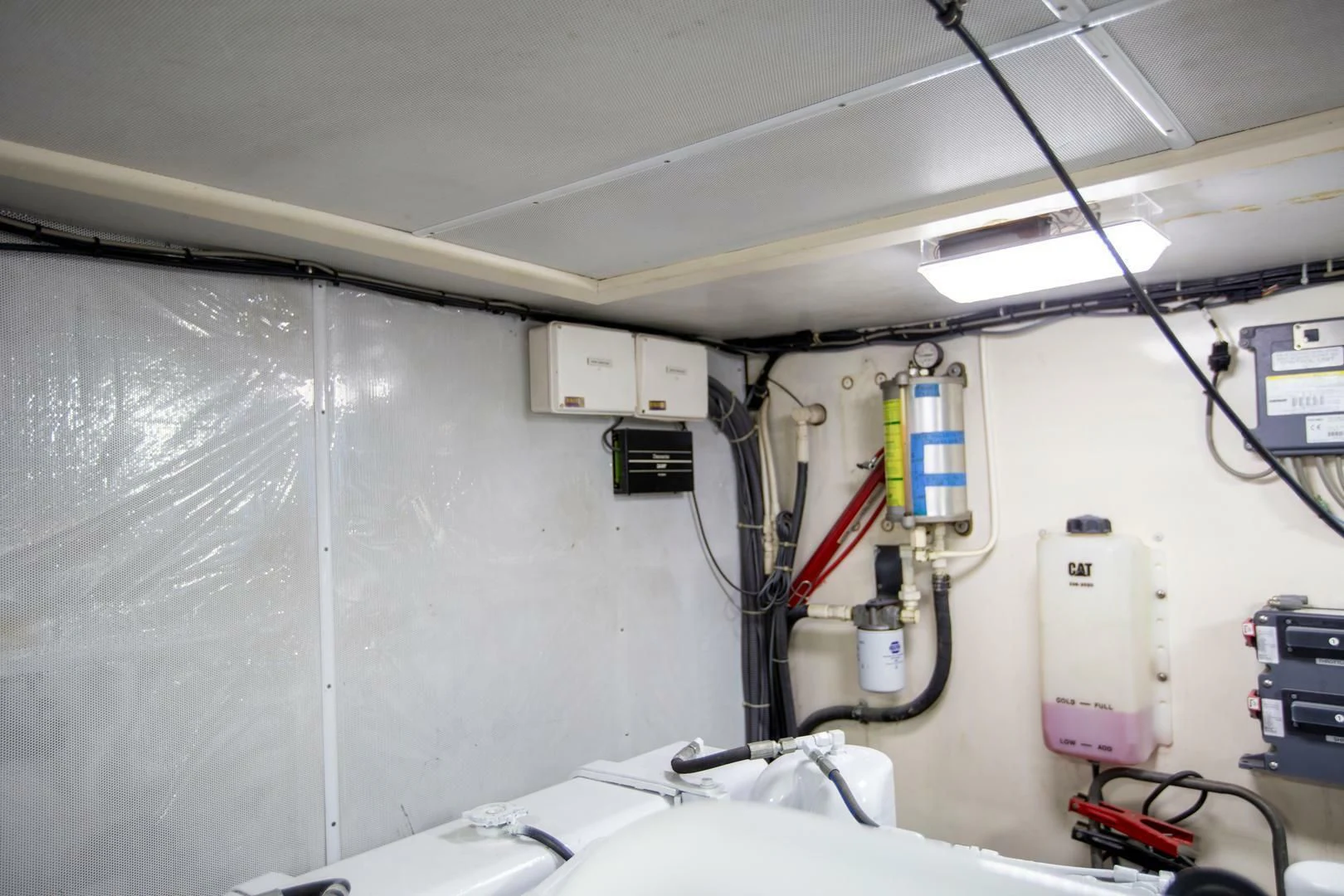 a white machine with wires aboard PAINKILLER Yacht for Sale