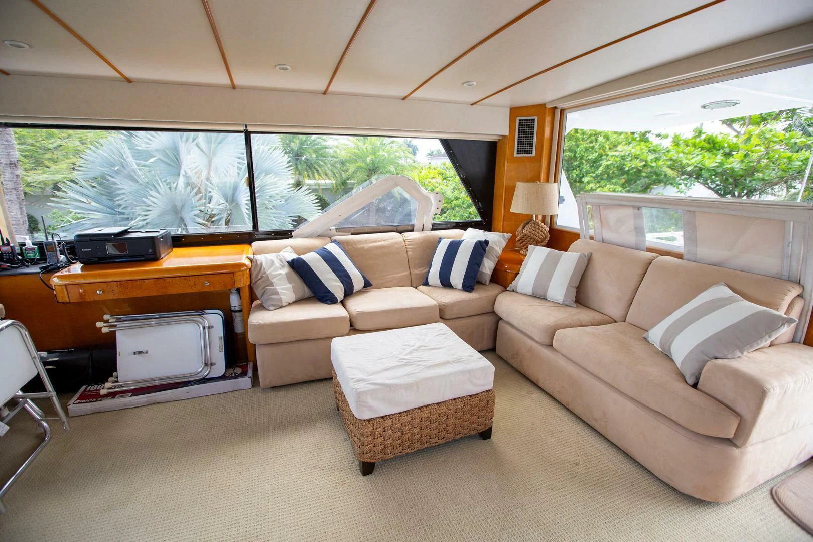 a living room with a couch and a tv aboard PAINKILLER Yacht for Sale