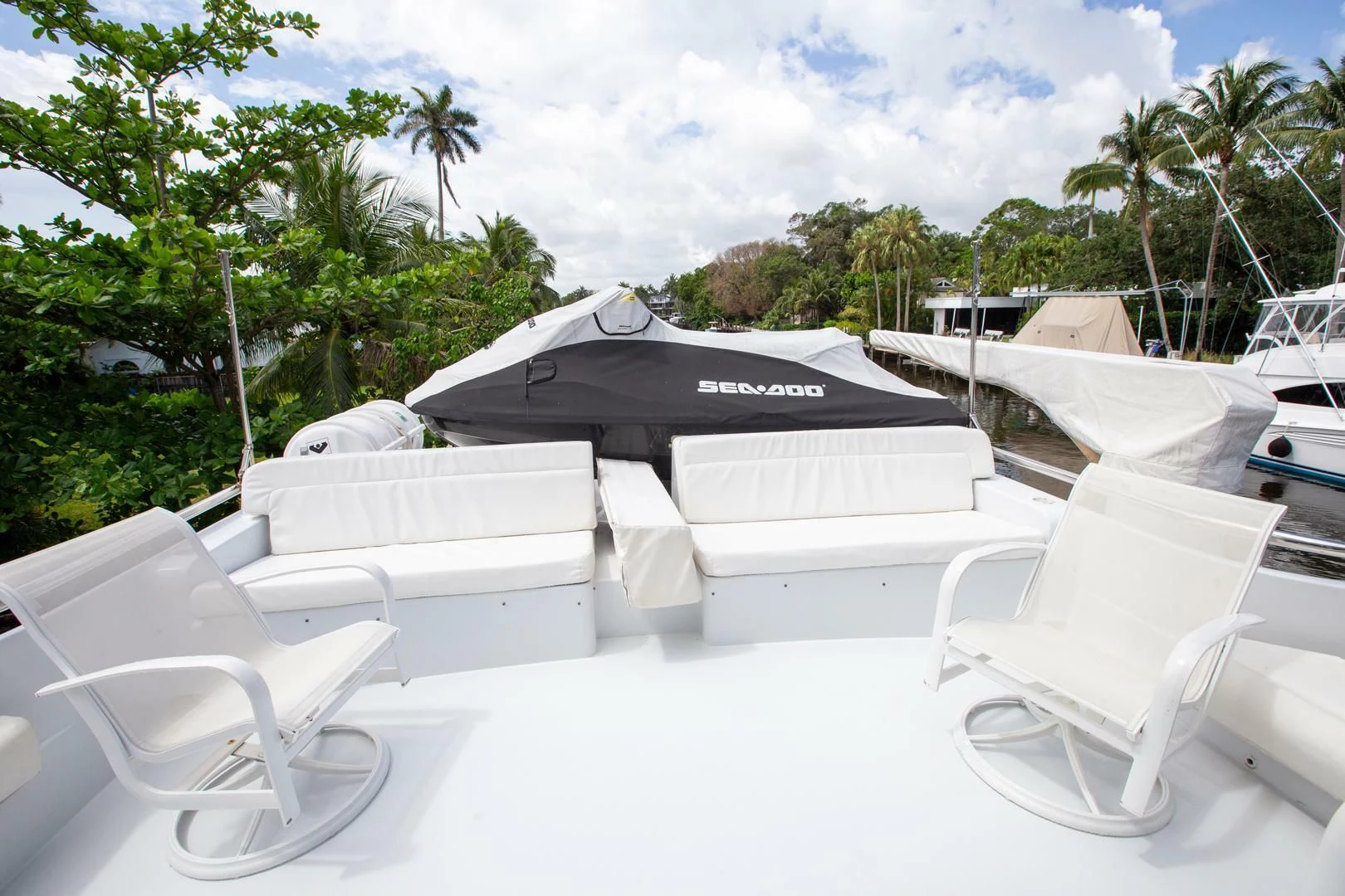 a group of chairs outside aboard PAINKILLER Yacht for Sale