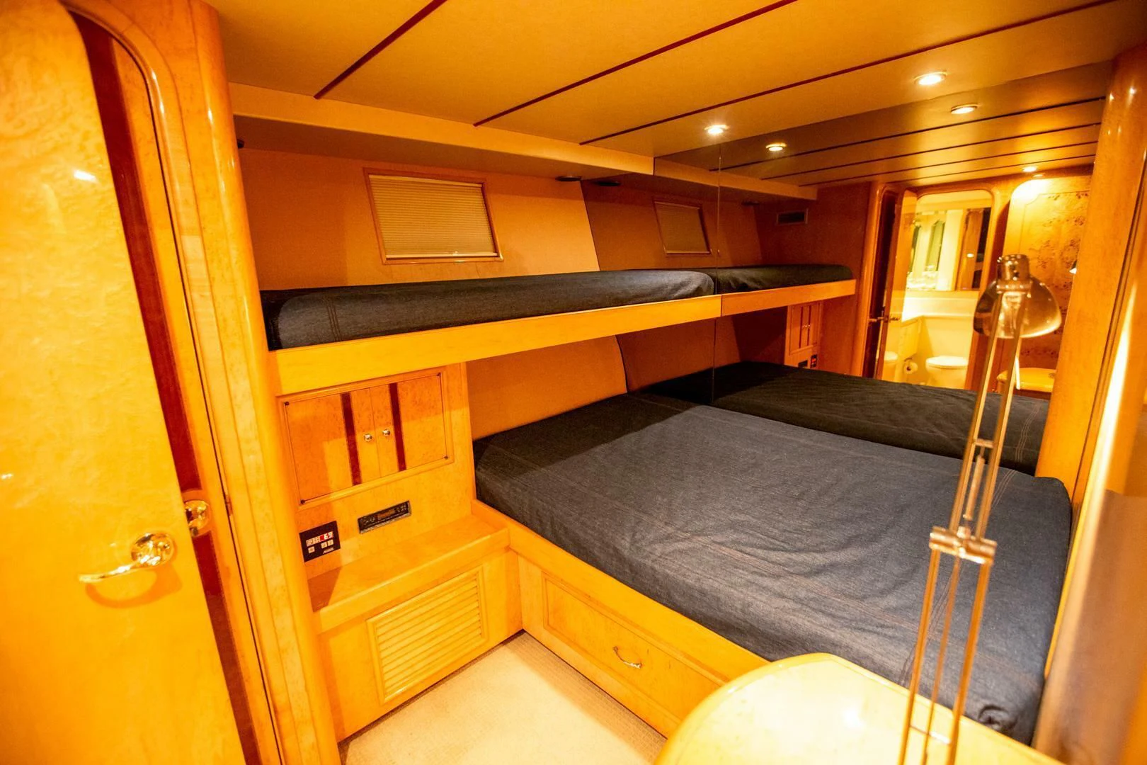 a bed in a room aboard PAINKILLER Yacht for Sale