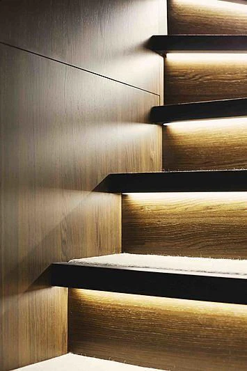 a set of wooden stairs aboard BACCHANAL Yacht for Sale