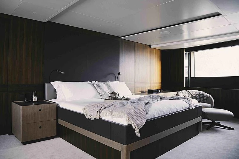 a room with two beds aboard BACCHANAL Yacht for Sale