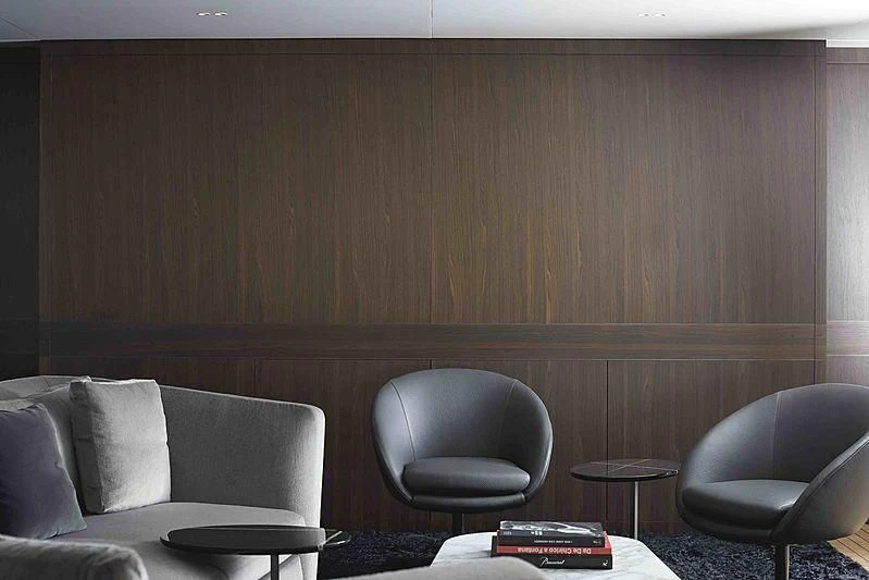 a room with a couch and a chair aboard BACCHANAL Yacht for Sale