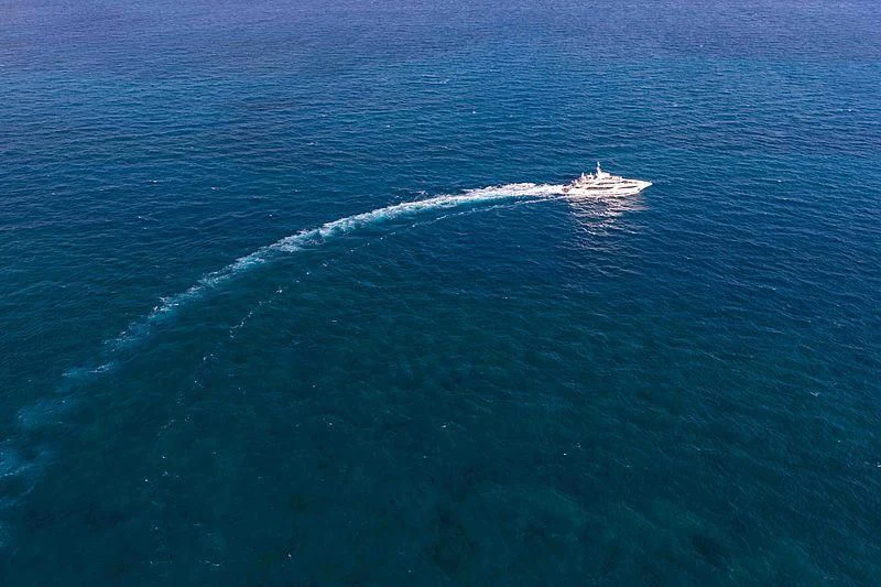 a boat in the water aboard BACCHANAL Yacht for Sale