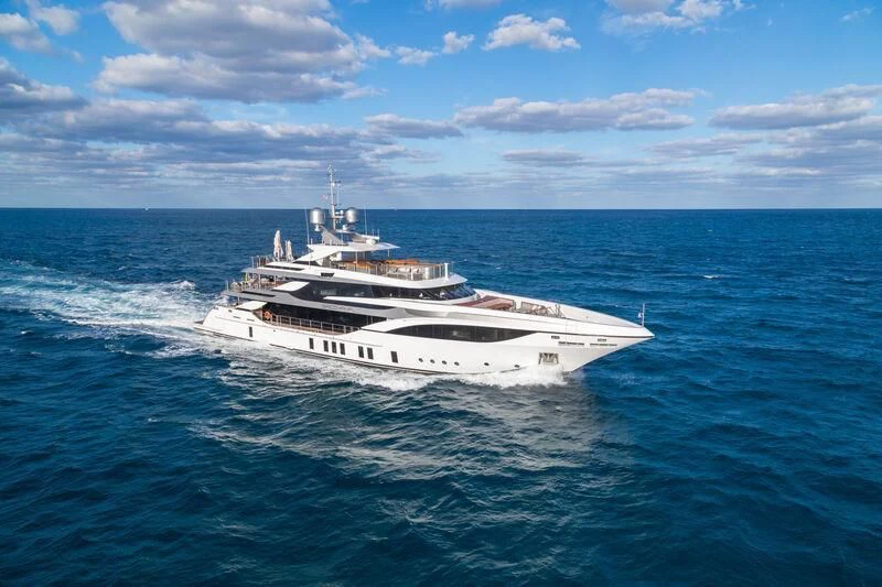 a large white boat in the water aboard BACCHANAL Yacht for Sale