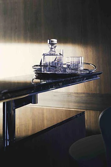 a group of glasses on a table aboard BACCHANAL Yacht for Sale