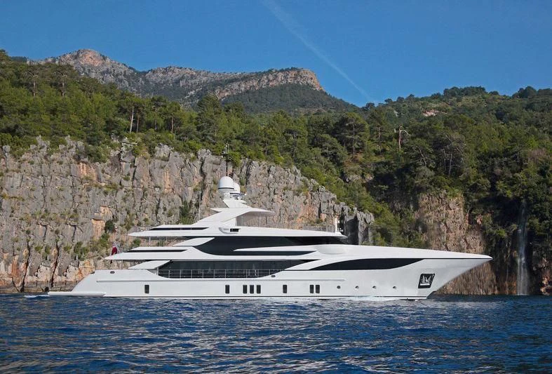 a large white yacht in the water aboard BACCHANAL Yacht for Sale